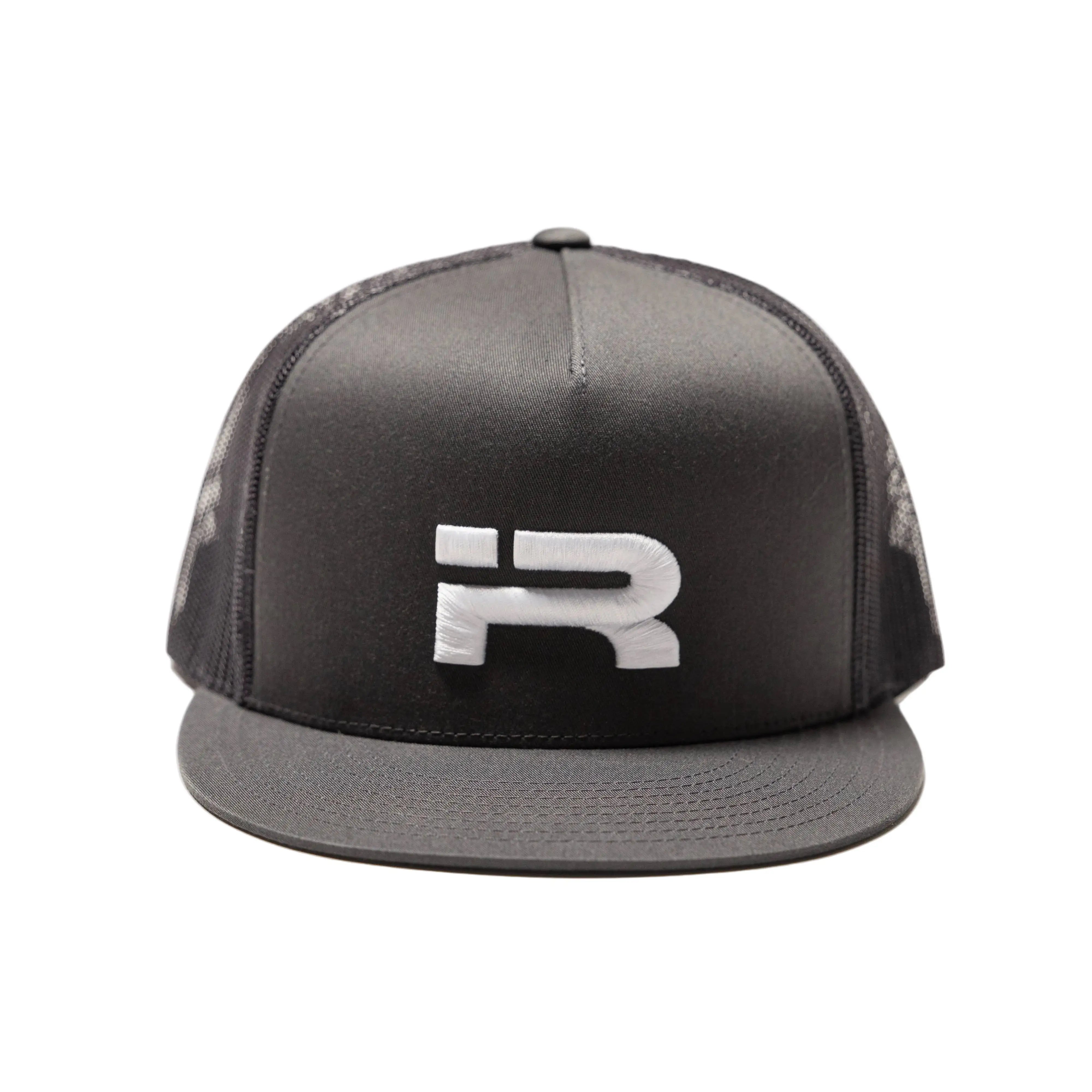 A charcoal trucker-style cap with a structured front panel, black mesh back, and a flat brim, featuring a large white stylized 'R' logo on the front. The cap is photographed against a clean, light off-white studio background.